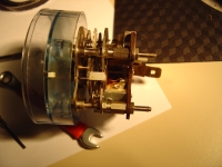  those blobs of solder and a thin wire have been added previously. there should be a low temp solder conenction there which fails if a short occurs. this has been soldered back up in a heavy duty manner